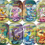 Prismatic Evolutions Mini Tins featuring eight colorful Pokémon collectible tins and art cards.